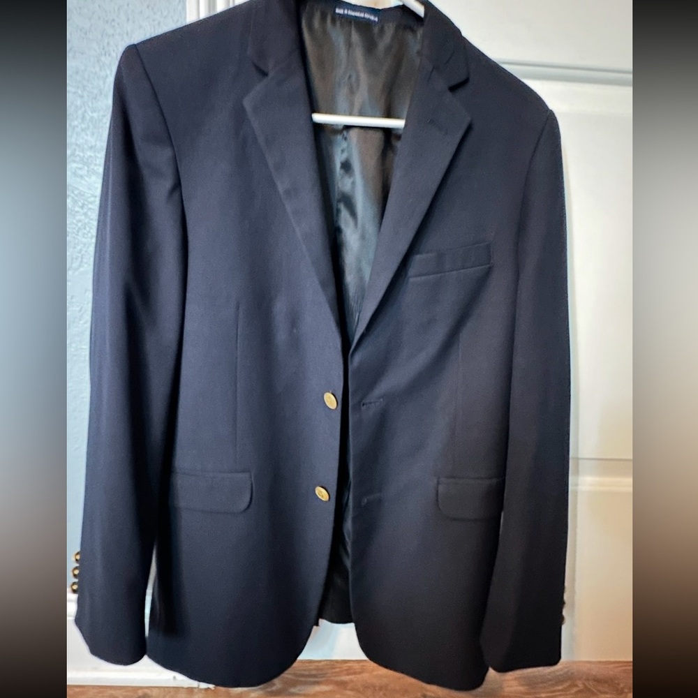 Dark blue blazer with gold buttons